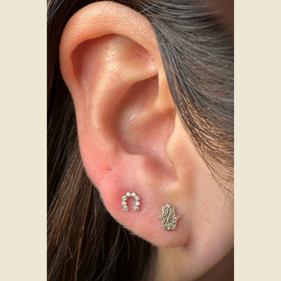 Aretes de Oro: Mano / Herradura